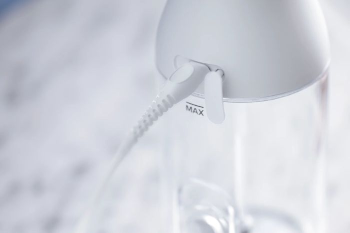 Іригатор Philips портативний Sonicare Cordless Power Flosser 3000, чаша 250 мл, чохол, 2 насадки , білий