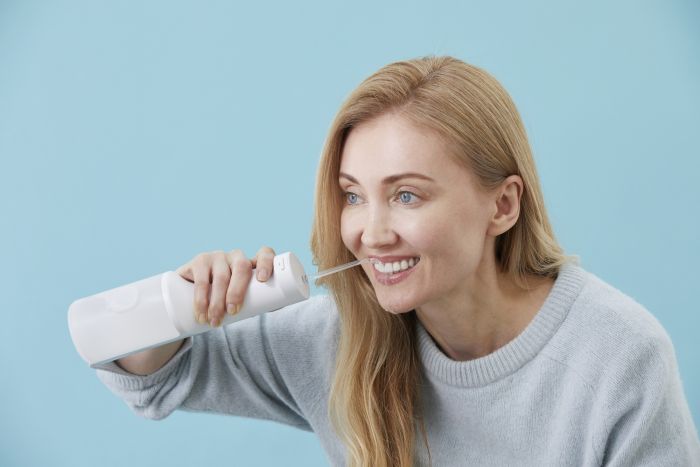 Ирригатор Panasonic портативний, чаша 200 мл, Li-ion аккум. в компл., 2 насадки, белый
