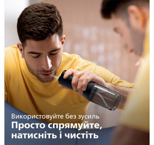 Ирригатор Philips Sonicare Cordless Power Flosser 3000 портативний, чаша 250 мл, чехол, 2 насадки , черный